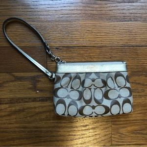 Coach zippered wristlet— tan with brown logo and gold accents and gold strap